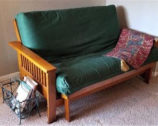 Great futon sofa for the extra room that can turn into a guest bedroom when needed.