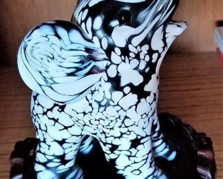 Glass and metal elephants and ceramic elephants