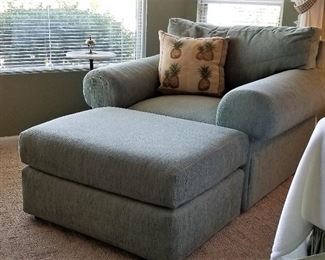 Extra wide club chair and matching ottoman.