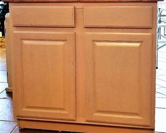 We have cabinets for sale. Cabinets opens up on both sides. Would make a great island. Tile top. We also have a longer cabinet and hanging white cabinets for sale.