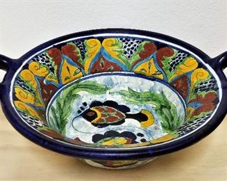 Beautiful colorful bowls and dishes for sale.