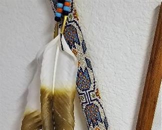 Beaded and feathered tomahawk. 