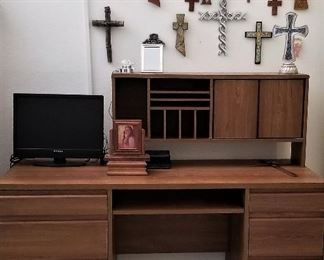Lots of crosses and office desk