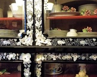 There is a beautiful set of white china.