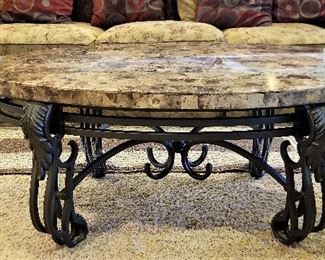 Beautiful round marble topped table with metal base.
