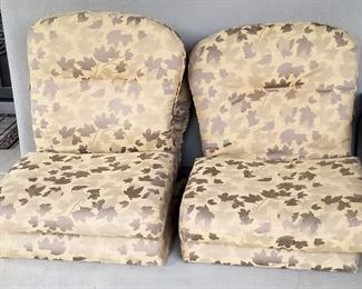 Leaf print patio cushions. There are 4 of them.