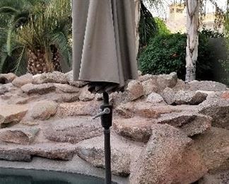 Outdoor Umbrella stand alone or use for an outdoor table.