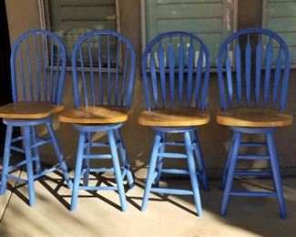4 swivel blue counter top stools. 