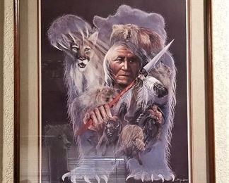 Native American art with an elder and mountain lion enveloped within a bear.