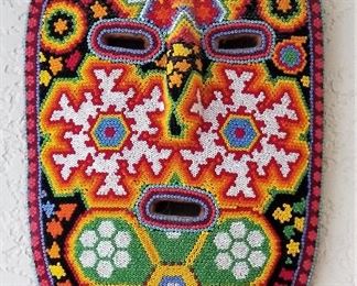 Beaded Mask wall decor.