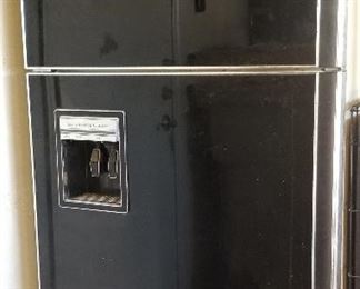 Black refrigerator and freezer combo.