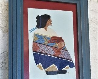 Simply lovely Native American woman art. The colors are great.