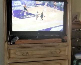 Storage and/or entertainment unit. The doors close. TV for sale too.