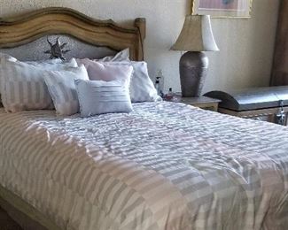 Super nice bedroom set with queen mattress and 2 end tables along with a dresser with mirror. There is also a matching truck and storage unit.