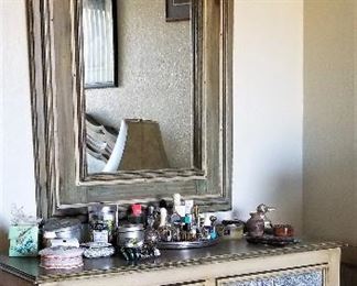 Super nice bedroom set with queen mattress and 2 end tables along with a dresser with mirror. There is also a matching truck and storage unit.