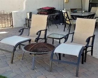 Outdoor chairs and ottomans. 