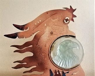 Metal and glass eagle candle light sculpture.