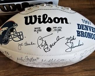 1997 Denver Broncos signed football with box.