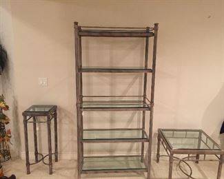 Heavy metal glass shelving unit! Have assorted matching tables.