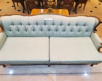 I SO LOVE this vintage couch. Originally bought it to keep in our jewelry center, but we never have the extra space in any sale. The couch has been re-upholstered, and is in perfect condition. Would make a beautiful photography backdrop!