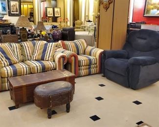 Over-sized recliner! Notice the vintage ottoman - love it. The cedar chest is also vintage.