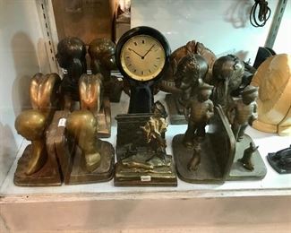 Collection of Art Deco bookends, clocks & more