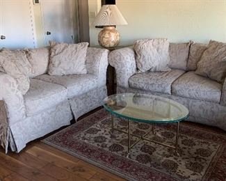 Loveseat x 2, Glass and Brass Coffee Table, Small Area Rug