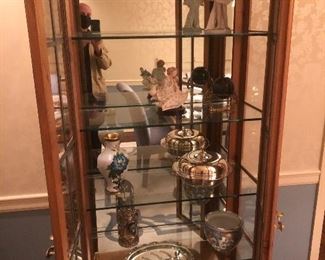 Pair of matching lighted curio cabinets