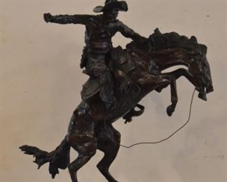 Fredric Remington bronze “bronco buster “