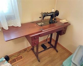 Singer Sewing Machine in Cabinet