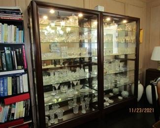 THESE ARE SEPARATE DISPLAY CABINETS.. ADJUSTABLE GLASS SHELVES AND THEY ARE LIGHTED OF COURSE... JUST INCREDIBLY GORGEOUS