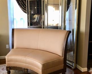Curved accent sofa & mirrored room divider 