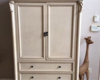 The Cordonet Collection pocket door armoire