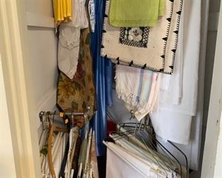 closet of table cloths and table runners