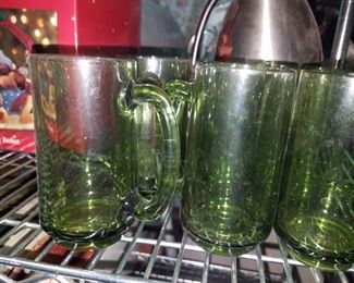 6 green mugs. $7