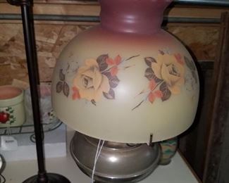 Metal oil lamp w / great glass shade.
$59