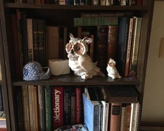Books and owl sculpture.