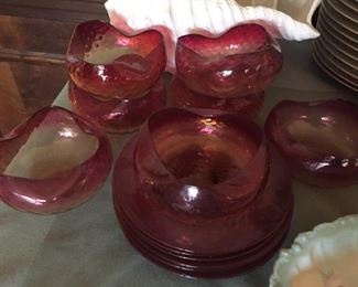 Red glass bowls and plates.