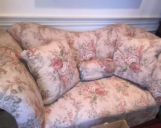 Floral love seat.