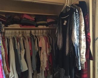 Huge selection of women's clothes - medium to large, new and vintage.
