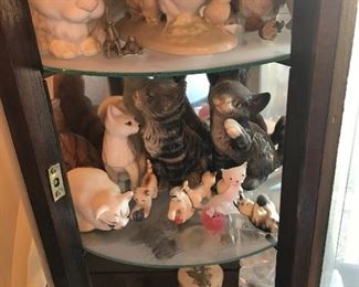 Small display cabinet with rabbits.