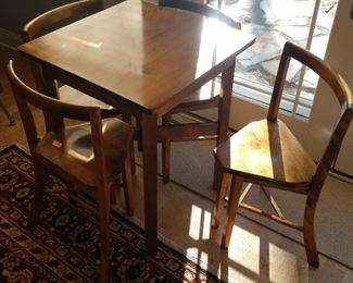 VINTAGE FOUR CHAIRS AND TABLE -- HANS OLSEN STYLE--$475 EACH SET.  TWO SETS ARE AVAILABLE. PREVIOUSLY FROM A DRUG STORE EITHER IN CHARLOTTE OR OVID.  ONE SET IS SOLD.