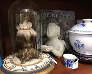 Angels, blue and white porcelain and books. 
