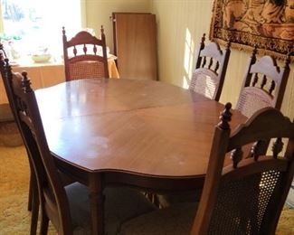 Dining table with two leafs