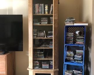 Bottom of cabinet opens to fabric covered door to conceal speakers