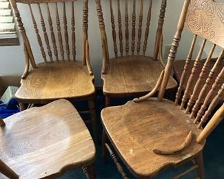 Set of 4 oak chairs.  Need some repair.  We have lots of antique chairs in need of repair at this event.