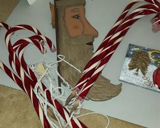 Santa Wall hanging 27 in and 8 lighted candy canes 24 inches