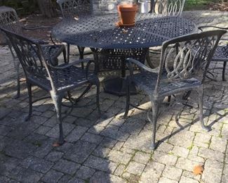 Hammond cast aluminum dining table and 6 arm chairs 