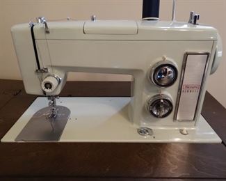 Sears Kenmore machine with cabinet