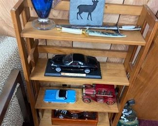 Shelf $65
Model cars $20-40